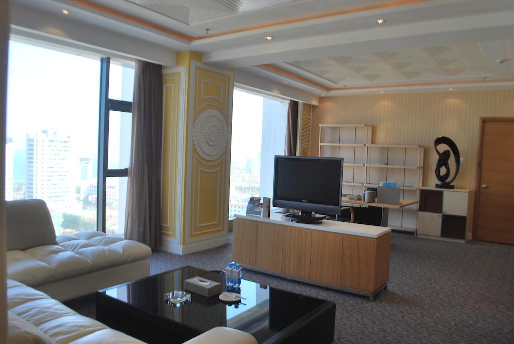 The Center Hotel Уейхай Стая снимка