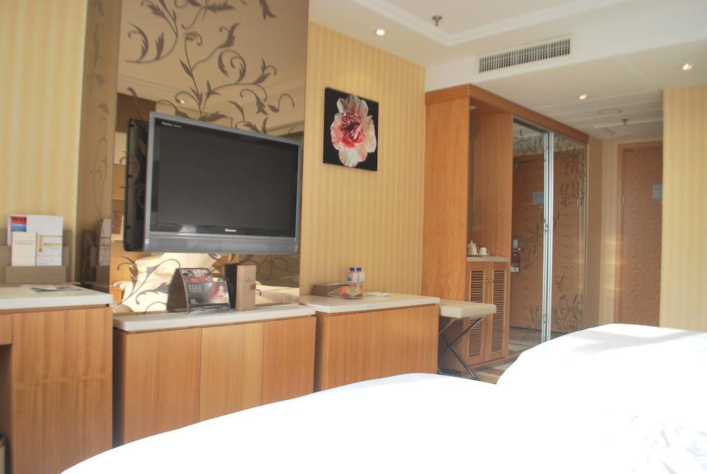 The Center Hotel Уейхай Стая снимка